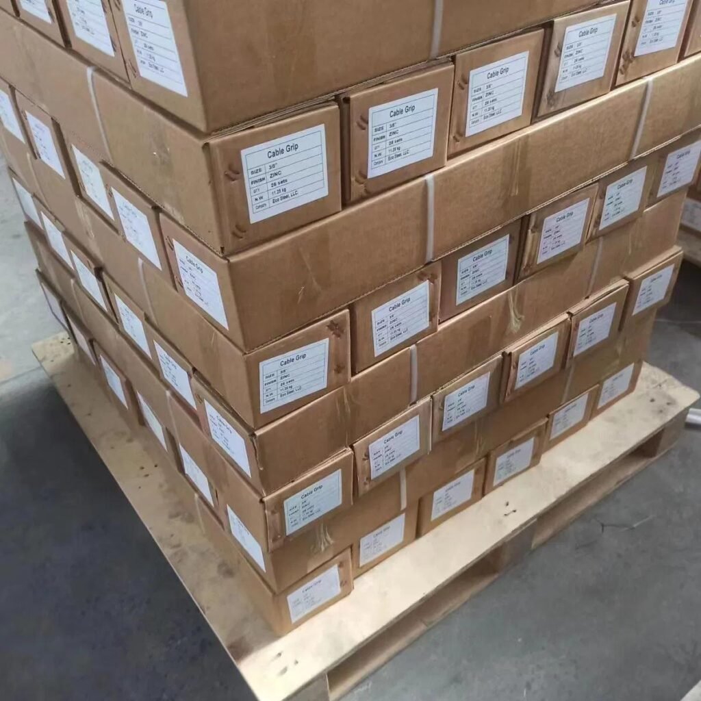 Stacked cartons of track fittings packed and ready for shipment
